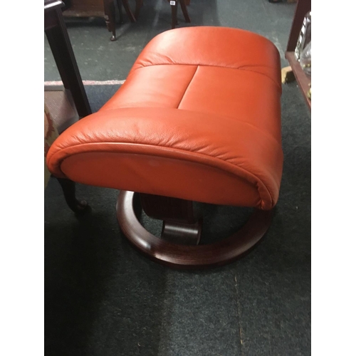 367 - TERRACOTTA COLOURED HIGH BACK EKONES REVOLVING ARMCHAIR WITH MATCHING FOOT REST