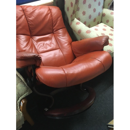 367 - TERRACOTTA COLOURED HIGH BACK EKONES REVOLVING ARMCHAIR WITH MATCHING FOOT REST