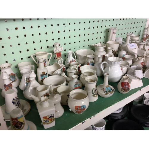 384 - SHELF OF APPROX 50 VARIOUS MINIATURE CRESTED WARE PIECES