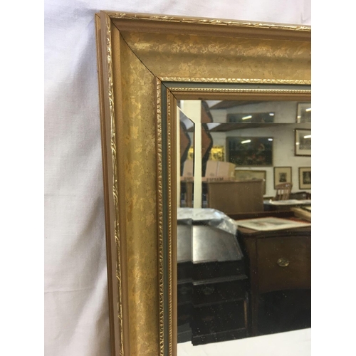 411 - GOLD WOOD FRAMED BEVELLED EDGE MIRROR, 28'' X 24''