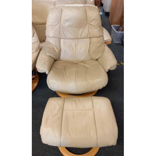 423 - EKORNES SWEDISH RECLINING & REVOLVING ARMCHAIR WITH MATCHING FOOT REST