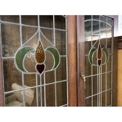 457 - ART NOUVEAU BREAK FRONT BUREAU BOOKCASE WITH LEADED STAINED GLASS DOORS & 3 DRAWERS WITH ORNATE DROP... 