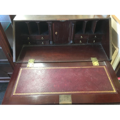 487 - GEORGIAN MAHOGANY WRITING BUREAU WITH FITTED INTERIOR & 4 LONG DRAWERS WITH BRASS DROP HANDLES & ESC... 