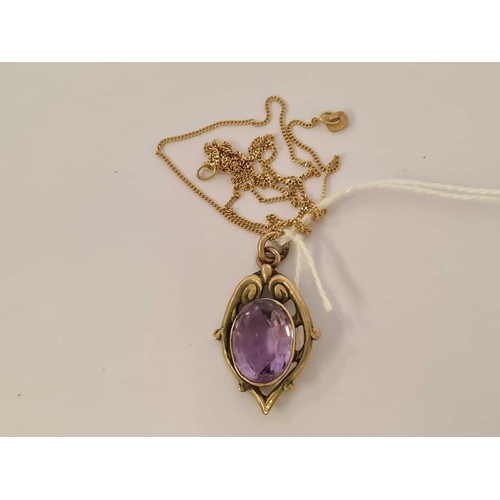 585 - AN AMETHYST PENDANT SET IN 9ct ON FINE GOLD CHAIN