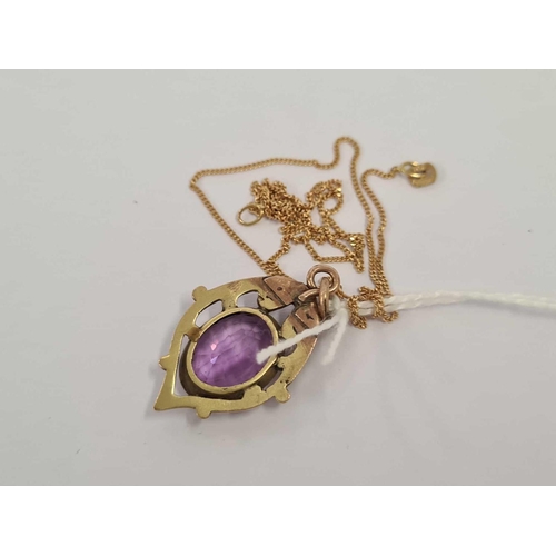 585 - AN AMETHYST PENDANT SET IN 9ct ON FINE GOLD CHAIN