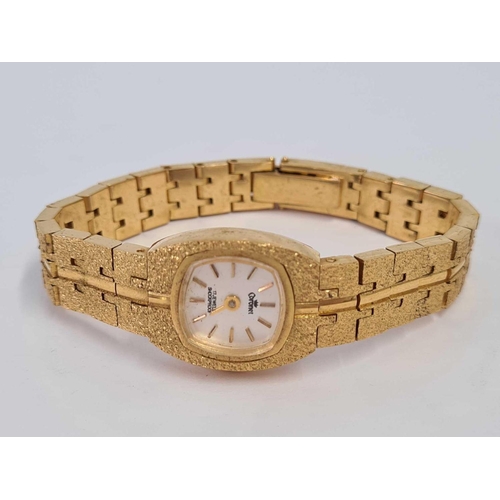 618 - A LADIES GILT WRIST WATCH BY CORONET