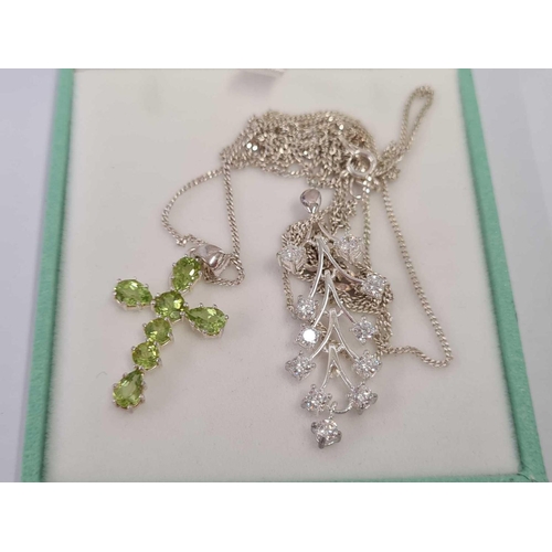 645 - SILVER CROSS & CHAIN WITH GREEN STONES & 1 OTHER WITH WHITE STONES