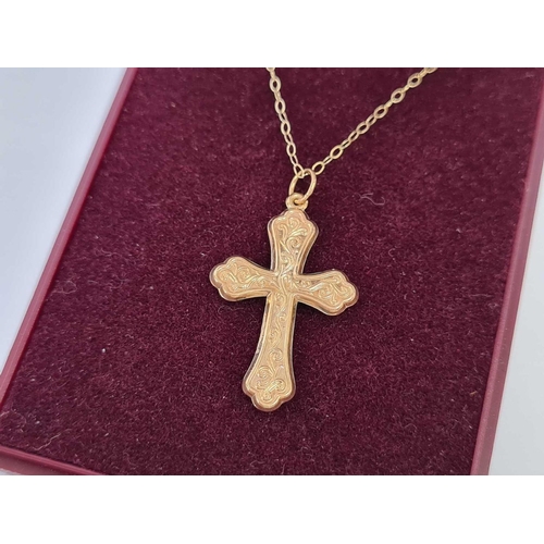 652 - GOLD CROSS ON NECK CHAIN