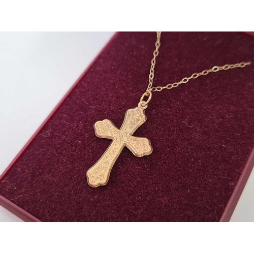 652 - GOLD CROSS ON NECK CHAIN