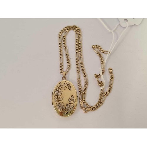 656 - AN OVAL 9ct LOCKET ON  9ct FLAT CURB NECK CHAIN