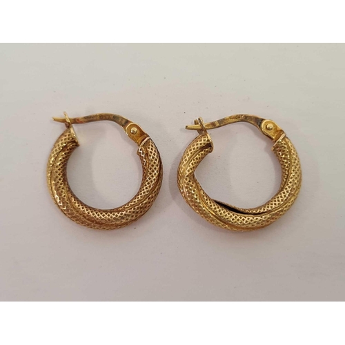 662 - A PAIR OF 9ct SNAKE SHAPED EARRINGS