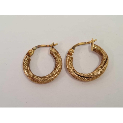 662 - A PAIR OF 9ct SNAKE SHAPED EARRINGS