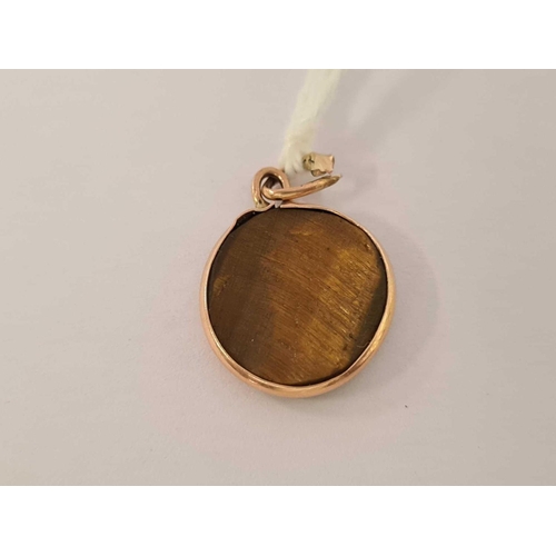 677 - ANTIQUE TIGER'S EYE PENDANT IN 9ct GOLD MOUNT