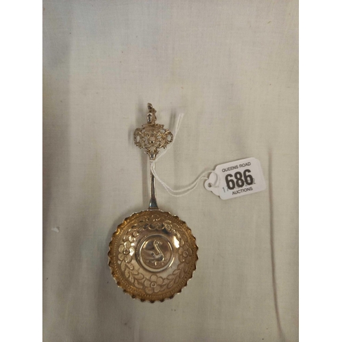 686 - AN ANTIQUE DUTCH SPOON WITH EMBOSSED BOWL