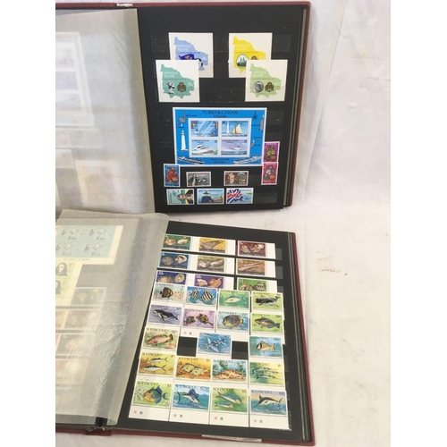 792 - 2 ALBUMS WITH MINT & USED SETS OF WORLD STAMPS