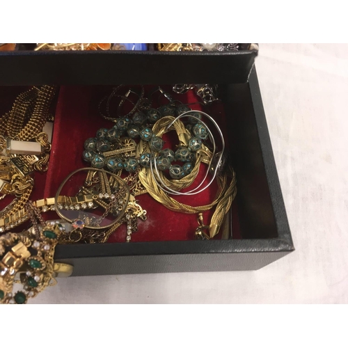 799 - BLACK JEWELLERY BOX OF COSTUME JEWELLERY