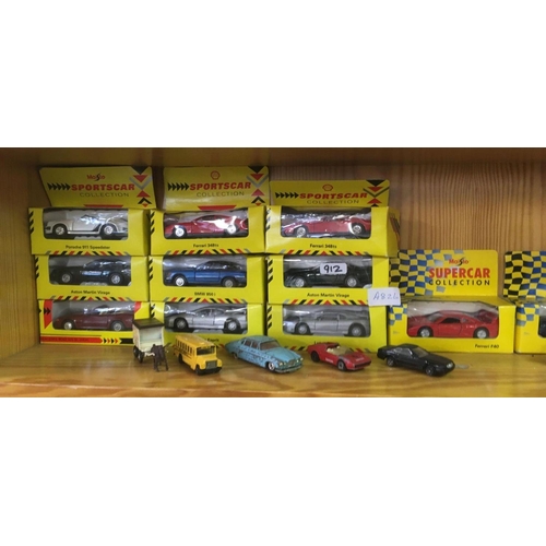 912 - 2 SHELVES OF MISC TOY CARS FROM THE SHELL SPORTS CAR COLLECTION & OTHER PLAY WORN TOYS