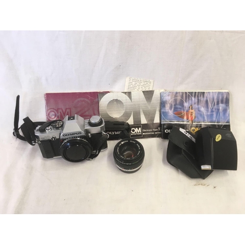 915 - OLYMPUS CAMERA WITH A TAMRON 80 - 210 mm LENSE, OLYMPUS 50 mm LENSE FLASH & INSTRUCTION MANUALS PLUS... 