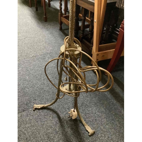 297 - DECORATIVE BRASS STANDARD LAMP ON TRIPOD LEGS WITH SHADE