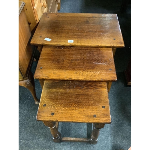 319 - CARVED OAK NEST OF 3 TABLES BY BRIGHT'S OF NETTLEBED