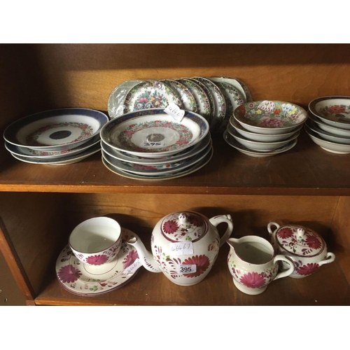 395 - 3 SHELVES OF VARIOUS CROCKERY INCL: TEA POTS, BOWLS, PLATES, SAUCERS ETC