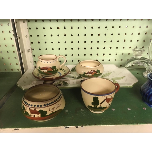 403 - SHELF OF POTTERY & GLASS INCL: MOTTO WARE, PAPERWEIGHTS ETC