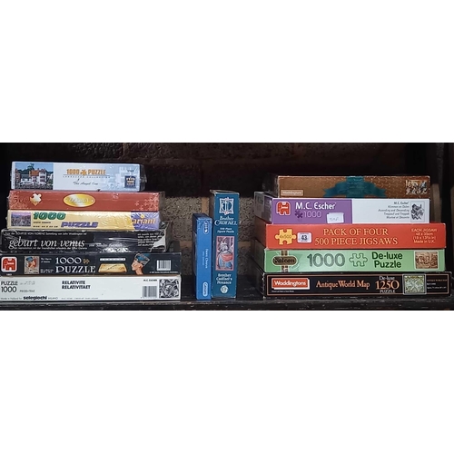 43 - SHELF OF MISC JIGSAW PUZZLES