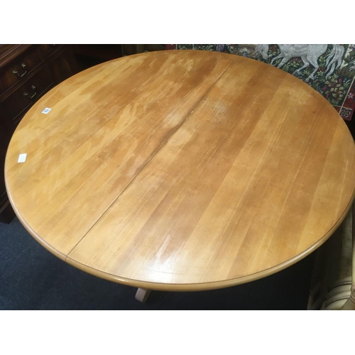 458 - MODERN CIRCULAR BEECH EXTENDING DINING TABLE ON PEDESTAL LEGS, 4ft DIA, EXTENDING TO 5ft 6''