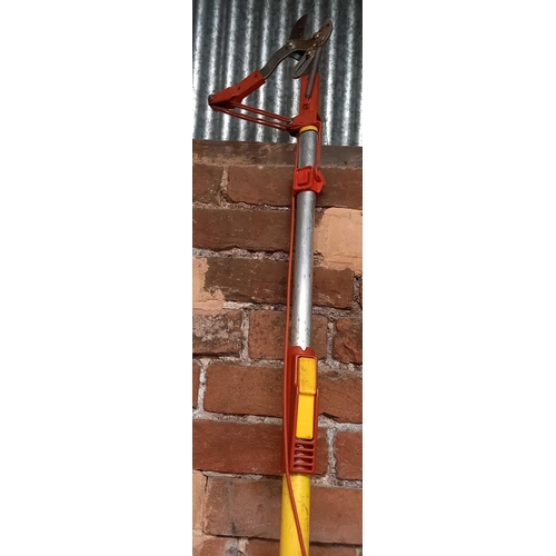 70 - 1 LONG ROLLER, A PATIO BROOM & A BRANCH LOPPER