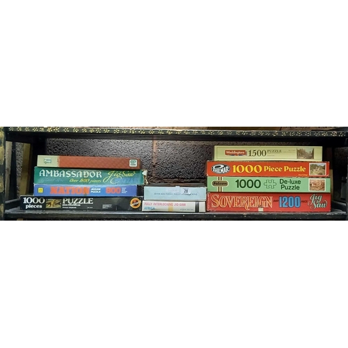 28 - SHELF OF MISC JIGSAW PUZZLES