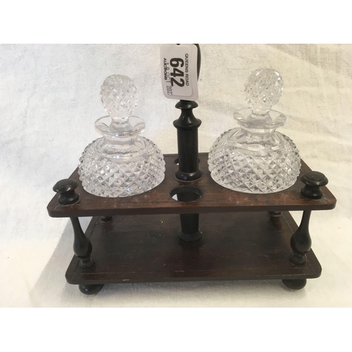 642 - EARLY VICTORIAN WOOD & BRASS STAND WITH 2 X CUT GLASS BOTTLES