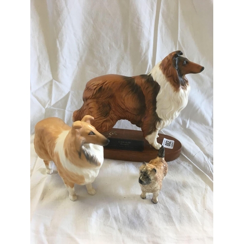 882 - 3 BESWICK DOGS, COLLIE ON WOOD STAND WITH BROKEN LEG, CAIRN TERRIER & A COLLIE LOCHINAR OF LADYPARK