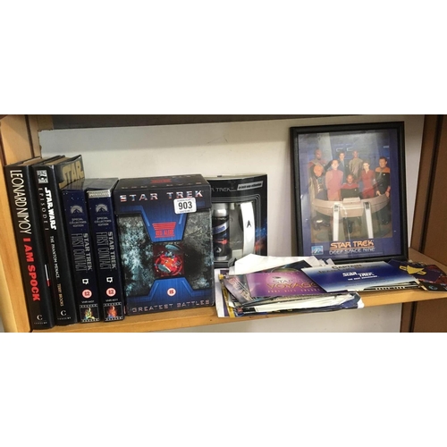 903 - SHELF WITH STAR WARS & STAR TREK ITEMS FROM EXHIBITION, VHS TAPES, FRAMED GLASS PICTURES