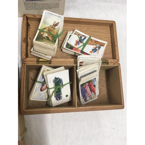 908 - 4 CARTONS OF CIGARETTE CARD ALBUM & A WOODEN BOX OF MISC CIGARETTE & 'T' CARDS