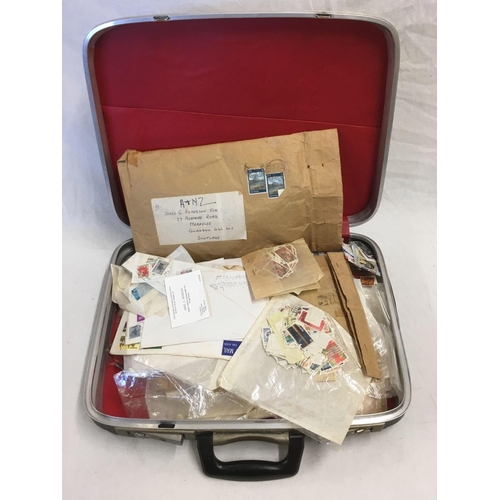 922 - BRIEFCASE WITH MISC POSTAGE STAMPS