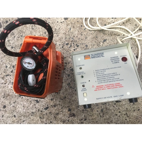 28 - SMALL AIR COMPRESSOR & A SUNRISE MEDICAL BATTERY CHARGER