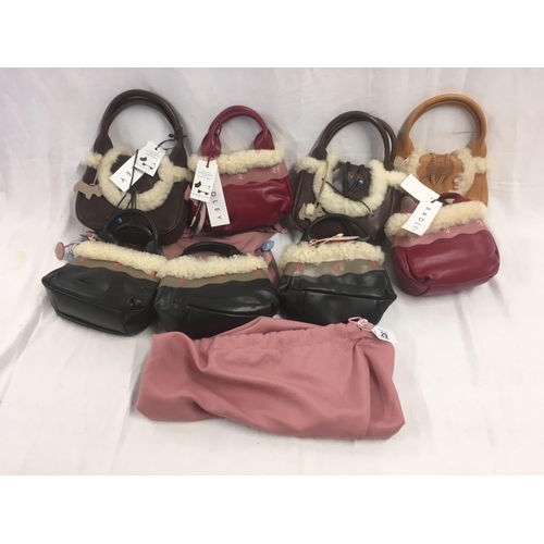 29 - 8 SMALL HANDBAGS BEARING THE NAME OF RADLEY WITH SHEEPSKIN TRIM IN NEW CONDITION WITH LABELS