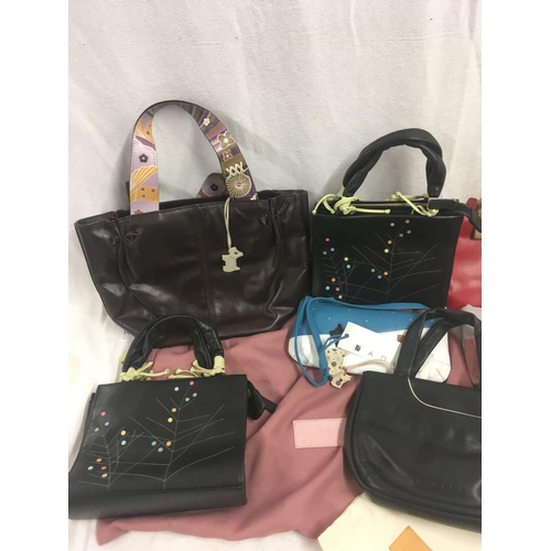 39 - 8 SMALL DARK COLOURED HANDBAGS IN NEW CONDITION, SOME WITH LABELS BEARING THE NAME ''RADLEY''