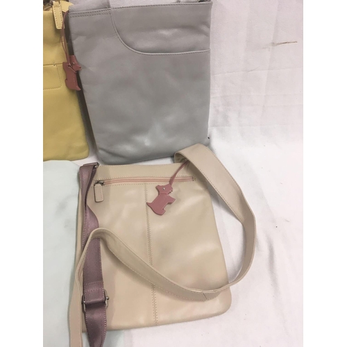 40 - 5 TRADITIONAL CROSSOVER HANDBAGS IN VARIOUS COLOURS, NEW CONDITION, BEARING THE NAME OF'' RADLEY''