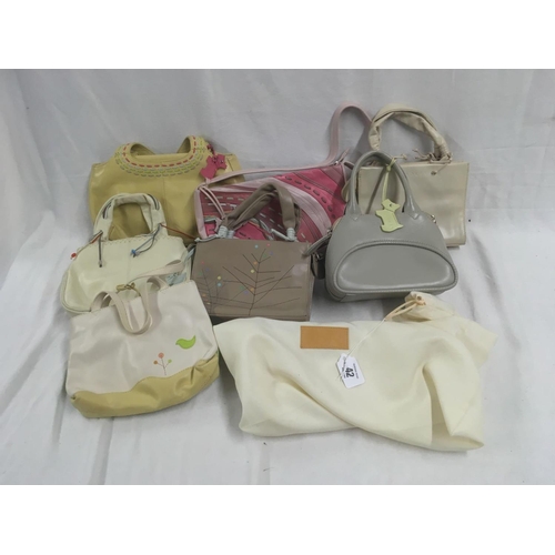 42 - 7 SMALL LIGHT COLOURED HANDBAGS IN NEW CONDITION, SOME WITH LABELS, BEARING THE NAME OF ''RADLEY''