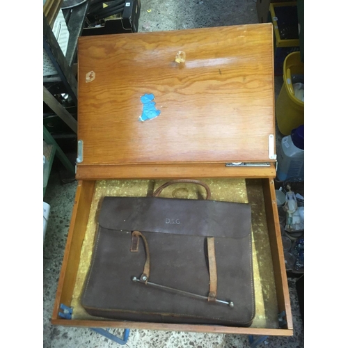 141 - CHILD'S WOOD & METAL DESK WITH INKWELL, WOODWORK NEEDS ATTENTION & A LEATHER DOCUMENT BAG