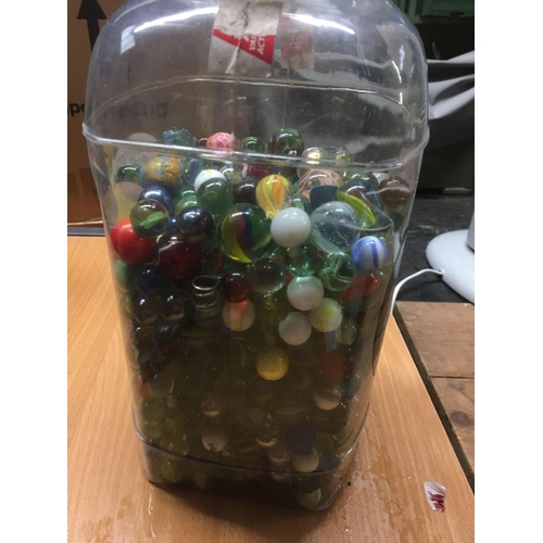 146 - JAR OF MISC GLASS MARBLES