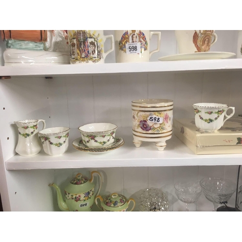 598 - 3 SHELVES OF CHINA & GLASSWARE INCL; AYNSLEY TEA WARE, COMMEMORATIVE CUPS ETC