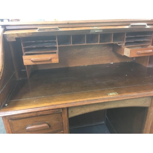 612 - ANTIQUE OAK ROLL FRONTED EDWARDIAN DESK