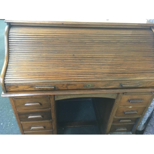 612 - ANTIQUE OAK ROLL FRONTED EDWARDIAN DESK