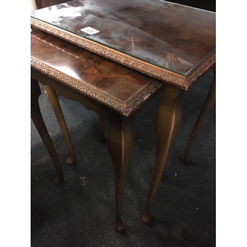 638 - NEST OF 2 WALNUT GLASS TOP TABLES