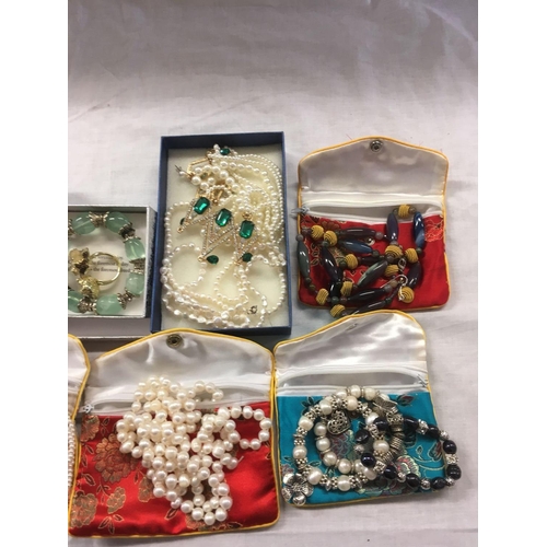 901 - CARTON OF STONE NECKLACES, COSTUME JEWELLERY IN SILK POUCHES