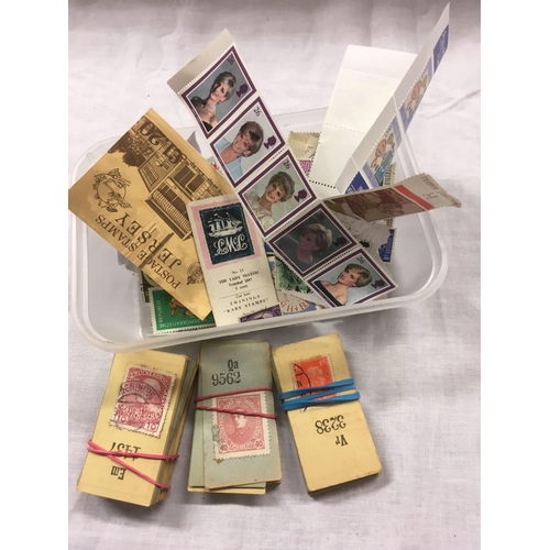 946 - CONTAINER OF FOREIGN STAMPS (SOME RARE) ENGLISH STAMPS IN A CATALOGUE