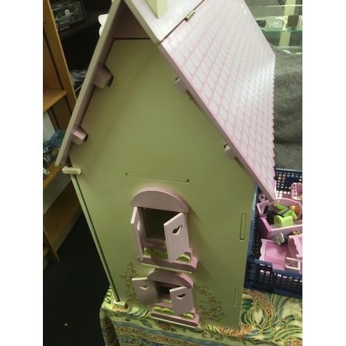 947 - PINK WOODEN DOLLS HOUSE WITH 2 LARGE BOXES OF FURNITURE