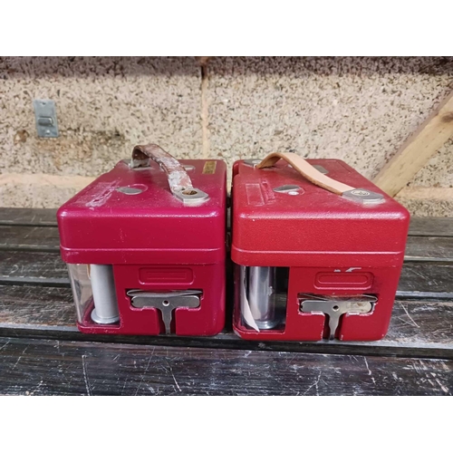 13 - 2 RED METAL CASED PIGEON RACE CLOCKS BY STB, BOTH WITH KEYS, NOT KNOWN IF WORKING